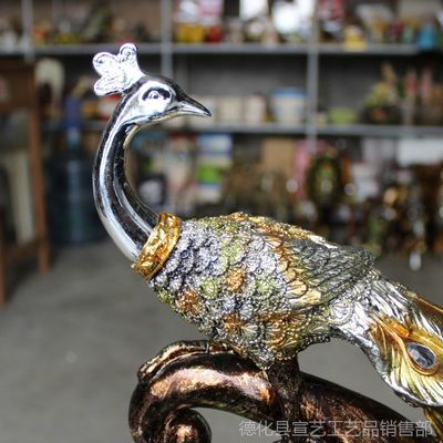 創(chuàng)意樹脂孔雀 點(diǎn)綴家居的藝術(shù)精靈